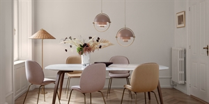 Guía de iluminación: 7 lámparas sobre mesa de comedor